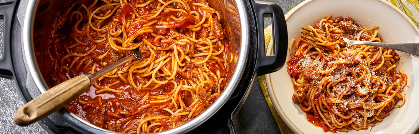 Spaghetti Bolognese being made in an Instant Pot® with Prego® sauce