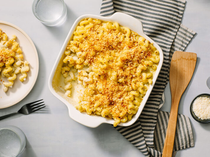 An image of prepared Pesto Mac & Cheese made with cavatappi pasta, Prego® Creamy Parmesan Pesto Sauce, Parmesan and white Cheddar cheese.
